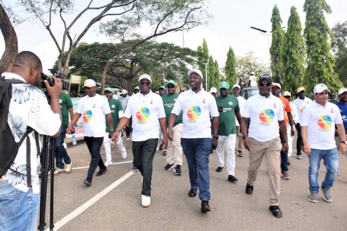 The Permanent Secretary, FMAFS, Dr Marcus Olaniyi Ogunbiyi(C) and other stakeholders during the Walk and Sensisization rally for the celebration of 2026 World Food Day