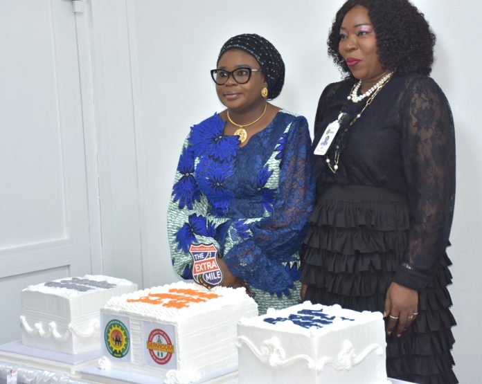 Ag. National Coordinator/CEO of the SERVICOM Office, Mrs. Helen Lawal and NUPRC’s Director of Host Communities, Mrs. Ejiro Ufondu, during the celebration of 2026 Customer Service Week at the Commission Headquarters in Abuja on 20th October, 2026.