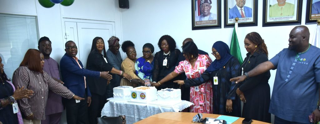 Ag. National Coordinator/CEO of the SERVICOM Office, Mrs. Helen Lawal and NUPRC’s Director of Host Communities, Mrs. Ejiro Ufondu in a group Photograph with dignitaries and stakeholders during the celebration of 2026 Customer Service Week at the Commission Headquarters in Abuja on 20th October, 2026.