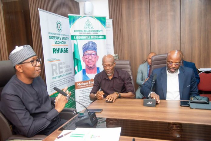 IMG-20261021-WA0036 Chairman, National Sports Commission, Mallam Shehu Dikko left, Acting Director-General of NFF, Dr. Emmanuel Ekpeme and Dr. Christian Emeruwa, Project led of CAF during their visit to NSC Chairman in his office on Tuesday.
