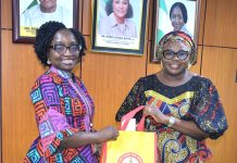 R – L; Ag. National Coordinator/CEO of the SERVICOM Office, Mrs. Helen Lawal presenting SERVICOM Awareness Materials to the Permanent Secretary Federal Ministry of Budget and Economic Planning, Mrs. Deborah Odoh after the latter was decorated as SERVICOM Champion during the official courtesy visit to the Ministry on 21st October, 2026 in Abuja.