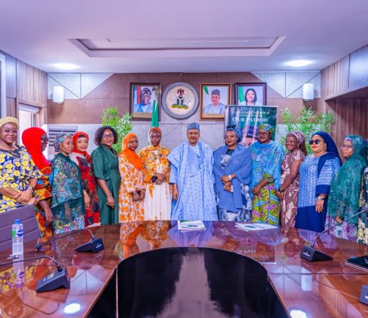 *COURTESY VISIT BY WOMEN OF INFLUENCE FOR TINUBU 2027* The Honourable Minister of Information and National Orientation, Mohammed Idris, fnipr, in a group photograph with the National Convener of Women of Influence for Tinubu 2027, Hauwa Farouk Ibrahim; Special Assistant on Administration to the Honourable Minister, Sunday Baba; Director of the Public Relations and Protocol Department (PRPD), Dr. Suleiman Haruna; Head of Protocol to the Honourable Minister, Oghenekevwe Uchendu; Chief Protocol Officer to the Honourable Minister, Sampson Ikemitang; and other members of the women’s political support group, following a courtesy visit on October 21, 2026, in Abuja. Photo: Khalid Ahmed/FMINO.