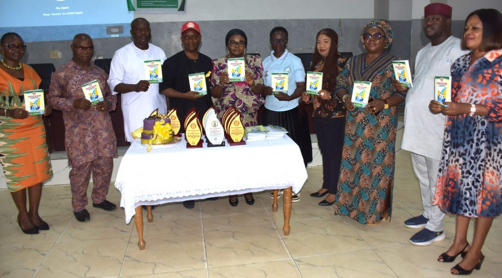 Ag. National Coordinator/CEO of the SERVICOM Office, Mrs. Helen Lawal in a group photograph with staff and management of the FCT Pension Department during the launch and unveiling of Service Charter and celebration of Year 2026 Customer Service Week on 22nd October, 2026 in Abuja.
