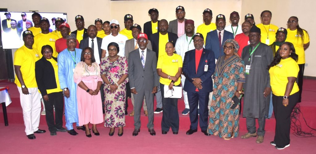 Ag. National Coordinator/CEO of the SERVICOM Office, Mrs. Helen Lawal and representative of the ICPC Chairman/Director of Special Services, Prince Hassan Mohammed in a group photograph with staff and management during the symposium organised to commemorate Year 2026 Customer Service Week by the Independent Corrupt Practices and Other Related Offences Commission (ICPC) on 22nd October, 2026 in Abuja.