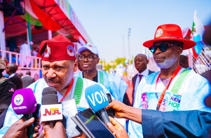 *APC 2027 PRESIDENTIAL CAMPAIGN FLAG-OFF MEGA RALLY* (L–R) The Honourable Minister of Information and National Orientation, Mohammed Idris, fnipr, and the Honourable Minister of Solid Minerals Development, Dr. Dele Alake, answering field questions from journalists during the APC 2027 Presidential Campaign Flag-Off Mega Rally on October 24, 2026, in Kaduna State. Photo: Khalid Ahmed/FMINO.