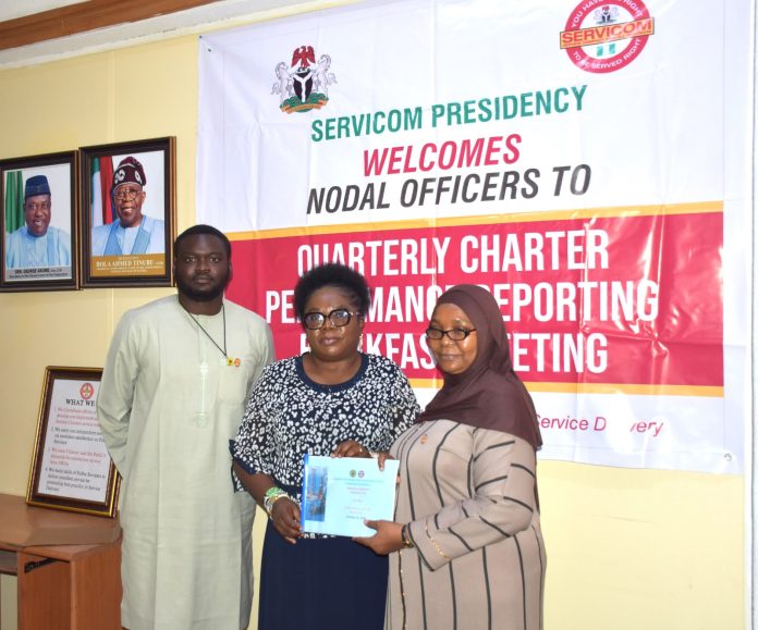 R – L; Nigerian Upstream Petroleum Regulatory Commission (NUPRC) Nodal Officer, Muinat Bello, Head of SERVICOM Operations Mrs. Ngozi Akinbodewa and Nigerian Upstream Petroleum Regulatory Commission (NUPRC) SERVICOM Desk Officer Bulus Gazar during the presentation of the Commission’s Q3 Report at the ongoing Charter Performance Reporting Breakfast Meeting at SERVICOM Office, Presidency on 26th October, 2026 in Abuja.