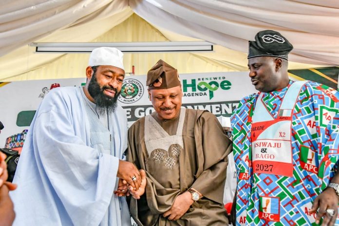 IMG-20261027-WA0063 L-R: His Excellency Mohammed Umar Bago, Executive Governor of Niger State; Honourable Minister of Information, Mohammed Idris, and Minister of State Agriculture abd Food Security, Dr Aliyu Sabi Abdullahi, at the inauguration of the Niger State APC Gubernatorial Campaign Council, held on Monday at the Niger State Government House, Minna, Niger state