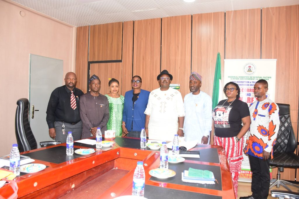 R – L, The Permanent Secretary, Federal Ministry of Special Duties and Intergovernmental Affairs, Dr. Onwusoro Maduka I. (4th) in a group photograph with the newly appointed Ministerial SERVICOM Committee (MSC) members during the event which held at Ministry’s Headquarters in Abuja on 29th October, 2026.